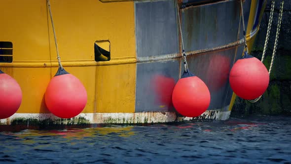Buoys On Side Of Boat alt