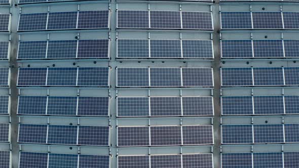 Aerial Drone View. Warehouse with Solar Panelsthe, Sunny Batteries for Receiving Alternative Energy alt