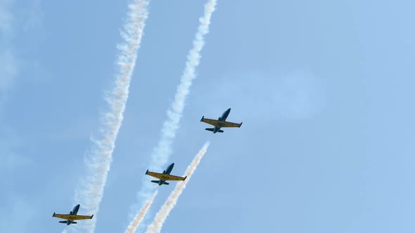Power Jets Fly in Sky and Leave Trail of Smoke, Making a Performance at Air Show alt
