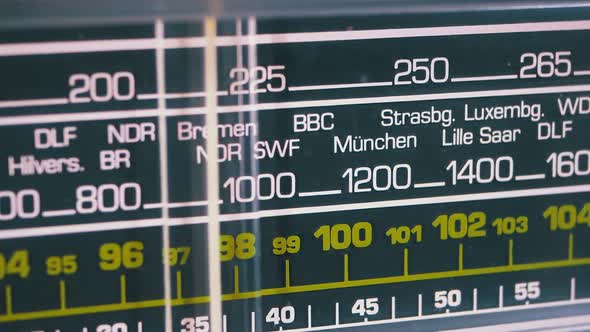 Tuning Analog Radio Dial Frequency on Scale of the Vintage Receiver alt