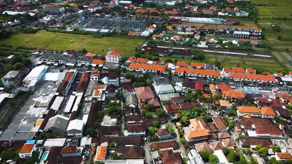 Wonderful Denpasar city drone with houses and rice field footage in Bali. This footage was shot duri alt