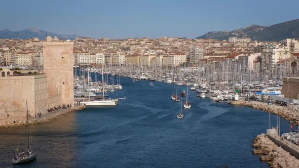 Yachts Coming To Marseille Old Port on Sunset. Marseille, France alt