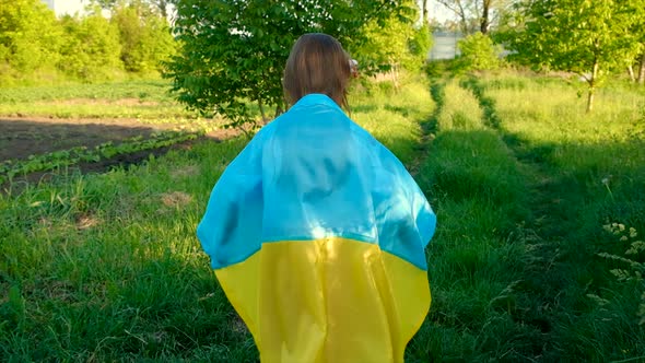 Patriot Child with Ukrainian Flag alt