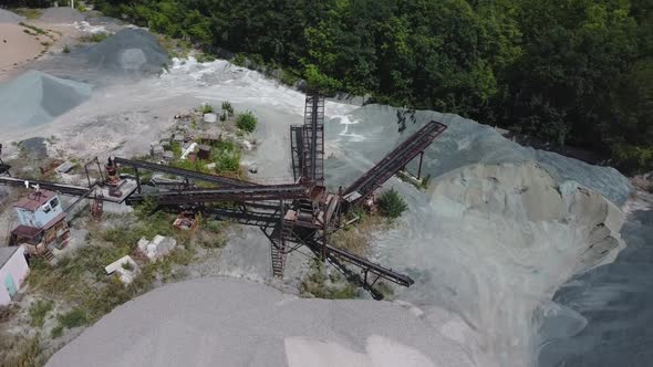 Aerial view of old rusty conveyor system for conveying bulk materials.