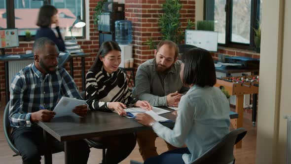 Multiethnic Team of HR People Interviewing Job Candidate alt