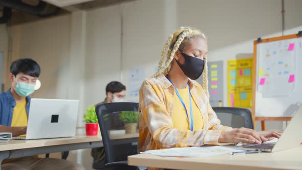 New normal working lifestyle asian female adult wearing protective face mask working alt