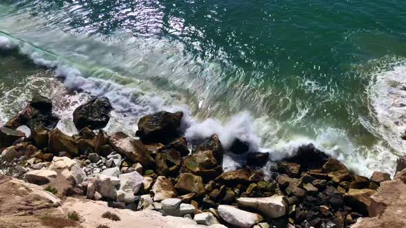 Beautiful waves hitting the rocks and cliff, Pismo Beach, California alt