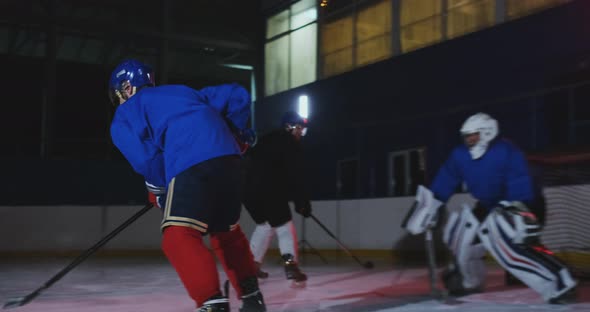 Professional Hockey Forward Technically Beats the Defender and Quickly Goes To the Hockey Goal alt