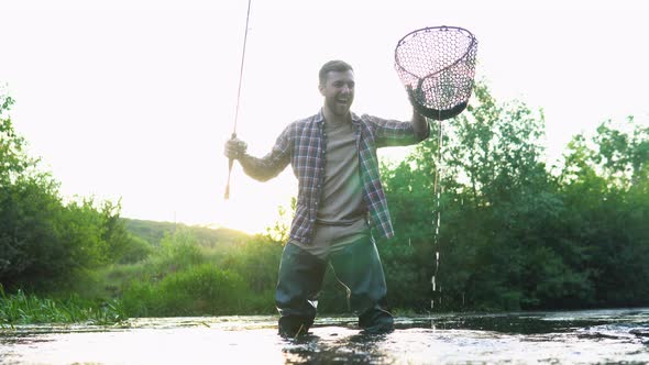 Fisherman with Fishing Rod on the River alt