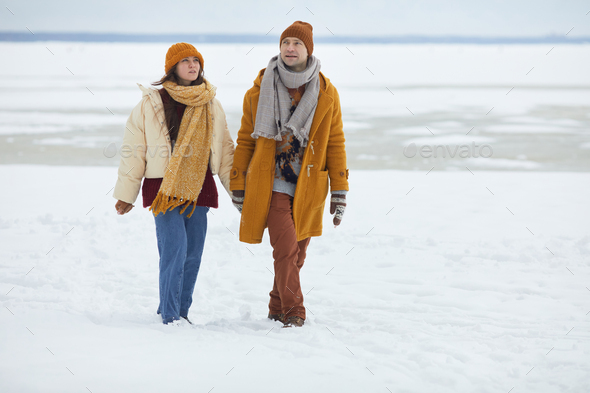 Couple Walking in Minimal Winter Landscape