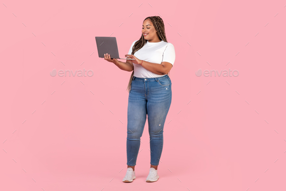 Happy Black Lady Using Laptop Computer Working Online, Pink Background
