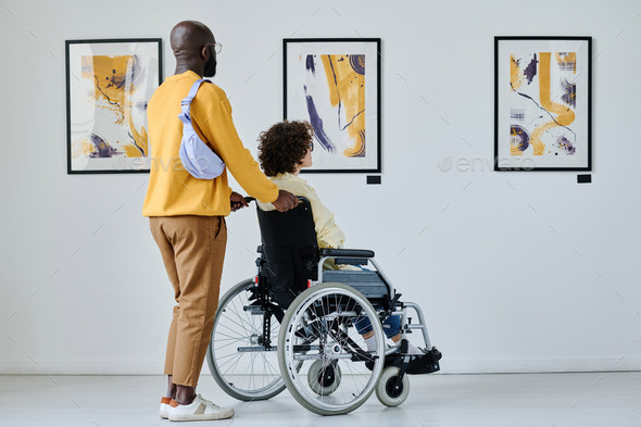Woman with disability visiting art gallery