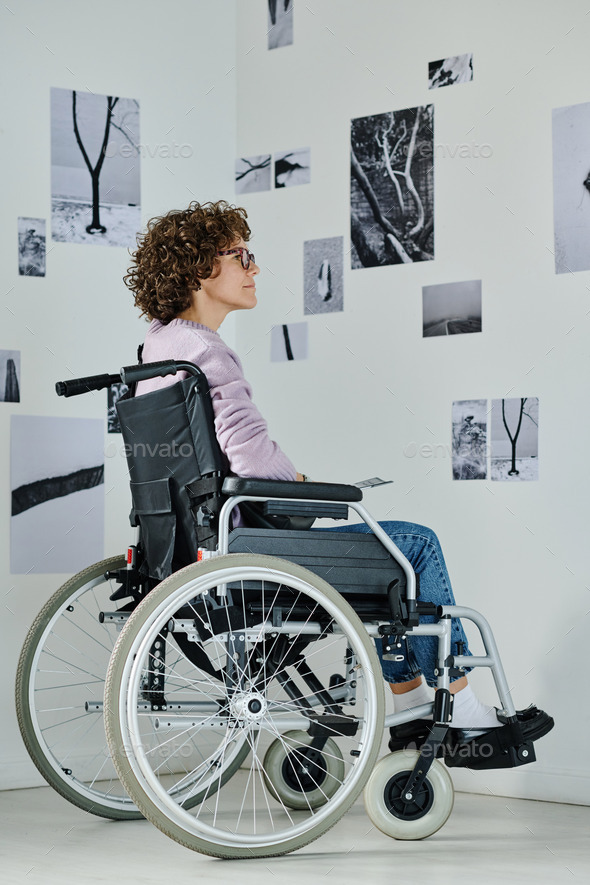 Woman with disability visiting exhibition