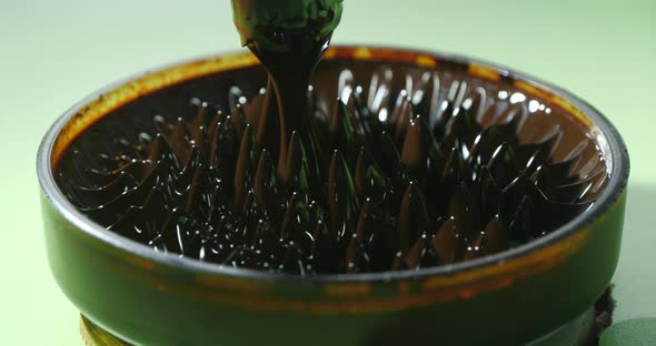 Ferrofluid. Ferromagnetic Fluid Creates Amazing Drawings Spikes in a Magnetic Field alt