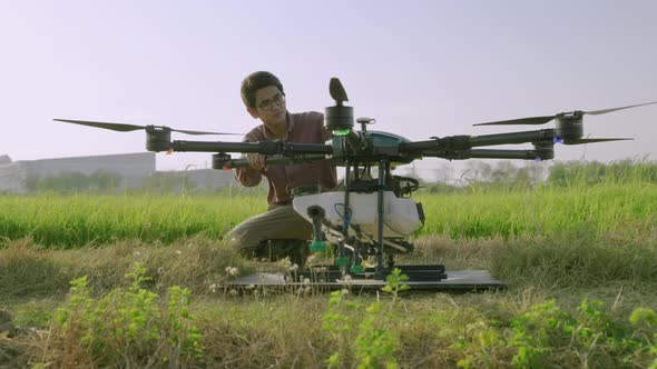 Engineers are inspecting Agricultural drones are taking off to spray medicine