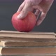 Placing A Ripe Apple On Books As Sign Of Education - VideoHive Item for Sale
