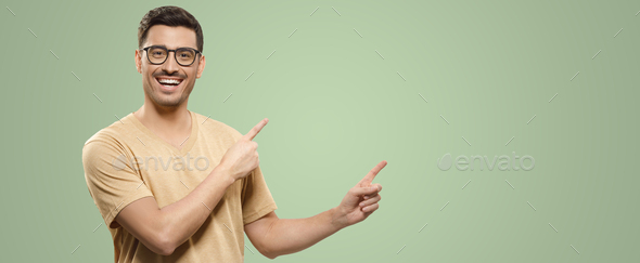 Banner of smiling guy in beige t-shirt and eyewear, showing commercial offer on right with hands