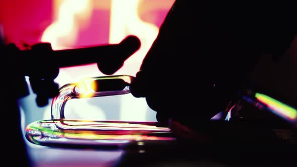 Man Hands making a Neon Sign at Workshop. alt