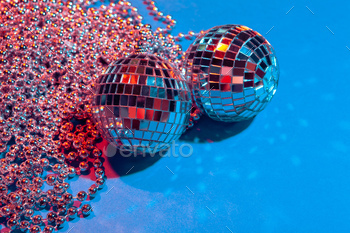 Mirror party balls put on table close up