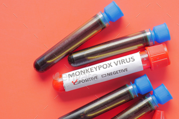 monkeypox text on blood text tube on red background 