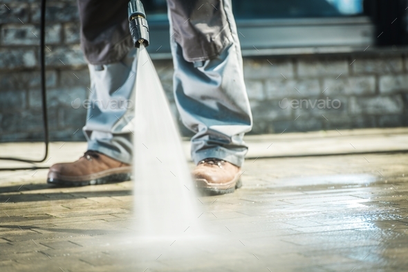 Using Pressure Washer - Stock Photo - Images