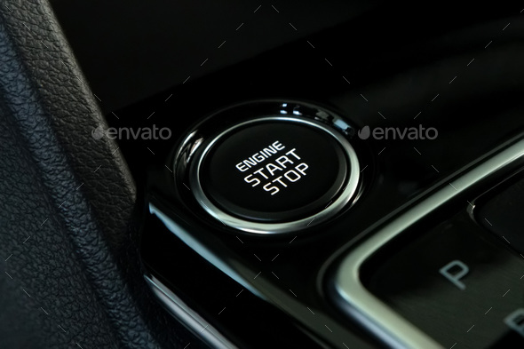 Engine start button in modern car close Stock Photo by Yakov_Oskanov