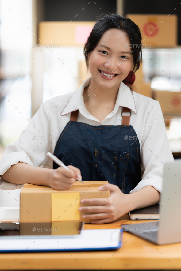 Asian small business owner working at home office. Business retail market and online sell marketing