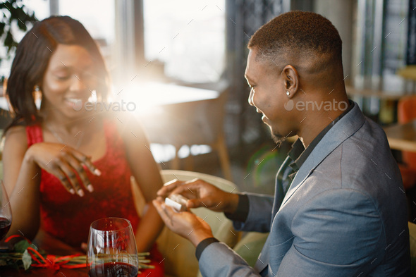 Black man presented an engagement ring for his girlfriend at restaurant