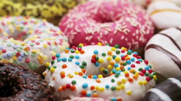 Assorted Donuts with Different Fillings and Icing alt