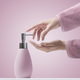 Woman pumping soap on her hands - PhotoDune Item for Sale