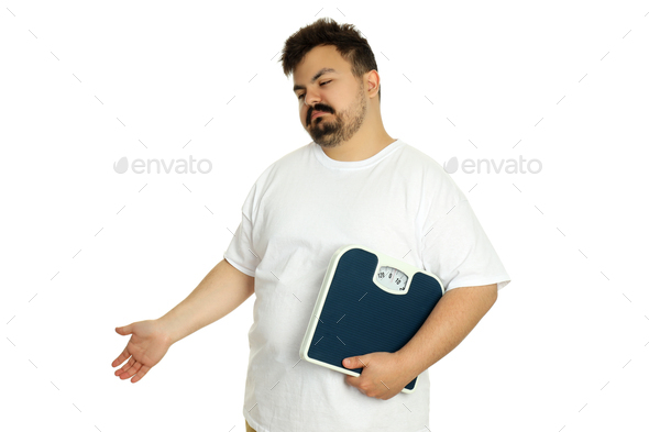 Concept of weight problems, young fat man isolated on white background