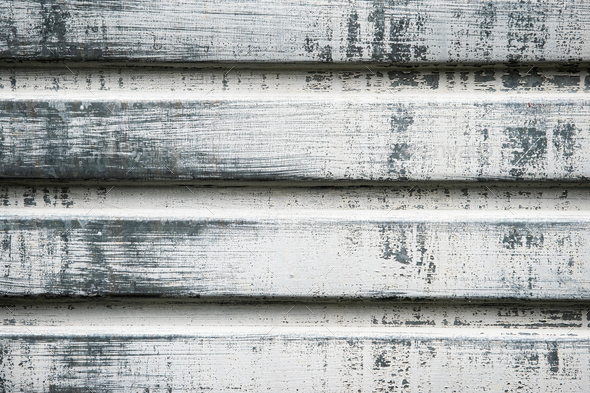 Paint white gray shabby rustic wooden plank or panel faded background.