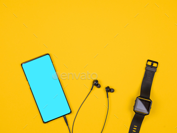 Flat lay top view of smartphone and smartwatch