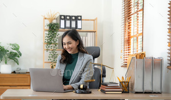 Asian business lawyer woman working with computer laptop in legal office.Law and Legal services
