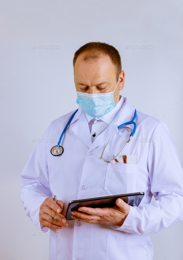 Clinic emergency hospital doctor at work physician using digital tablet