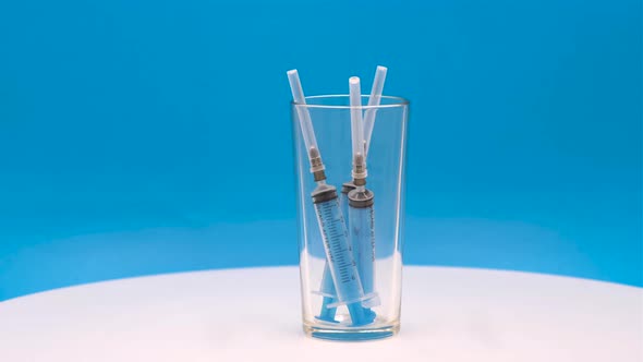 Disposable medical syringes