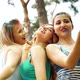 Happy Girls Laugh and Make Selfies after Holi Festival in Summer Park - VideoHive Item for Sale