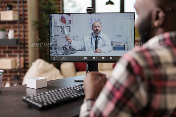 Adult talking to medic on telehealth videocall - Stock Photo - Images