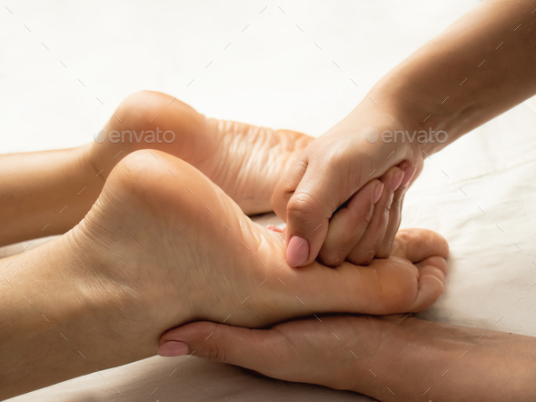 massage on the soles of the feet