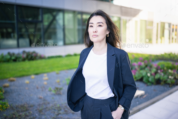 Asian confident business woman in suit walking. Job, work aspirational banner, copy space