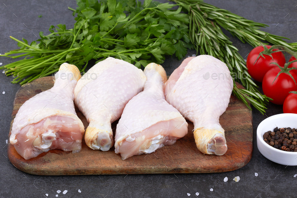 Chicken legs on black - Stock Photo - Images