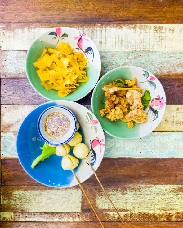 meatballs grilled, thai street food on wooden table background. Stock