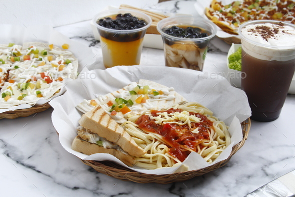 Freshly made assorted snack items such as quesadilla, pasta, sandwich and drinks