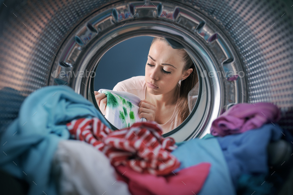 Woman finds stained clothes in the washing machine