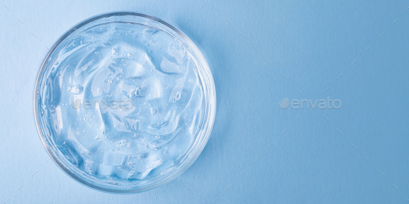 Top view of cosmetics gel with bubbly structure in the petri dish.Cosmetics banner with copy space.