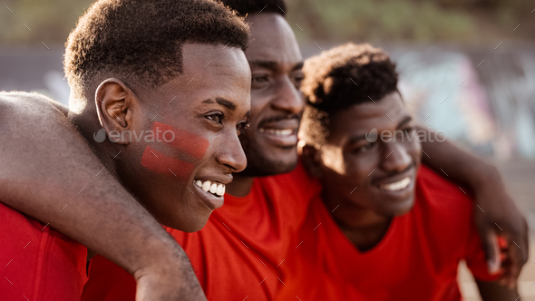 African football fans having fun supporting their favorite team - Sport entertainment concept - Stock Photo - Images