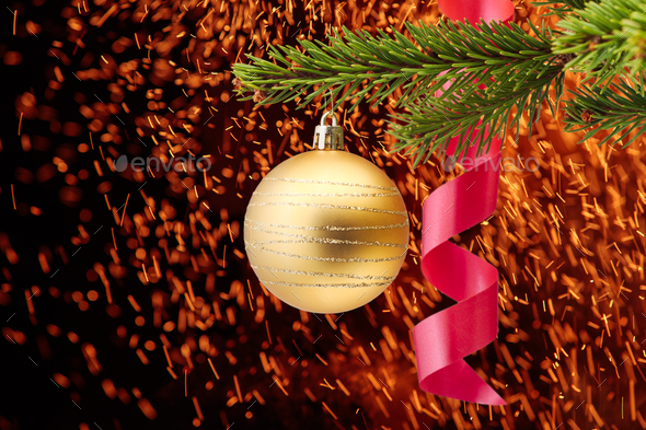 Christmas tree, Christmas balls and flying sparks, celebration background - Stock Photo - Images