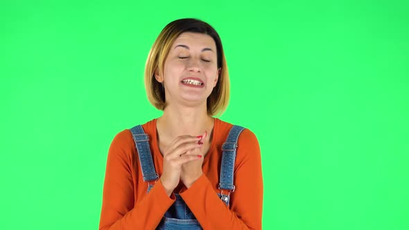 Beautiful Girl Is Reporting and Tells a Lot of Interesting Informations. Green Screen alt