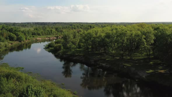 Flight Over the River and Forest on a Summer Day alt