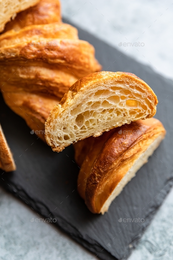 Cut in half croissant with inside texture and thin crisp layers